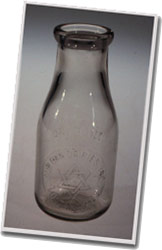 Photograph of a kosher milk bottle, circa 1920